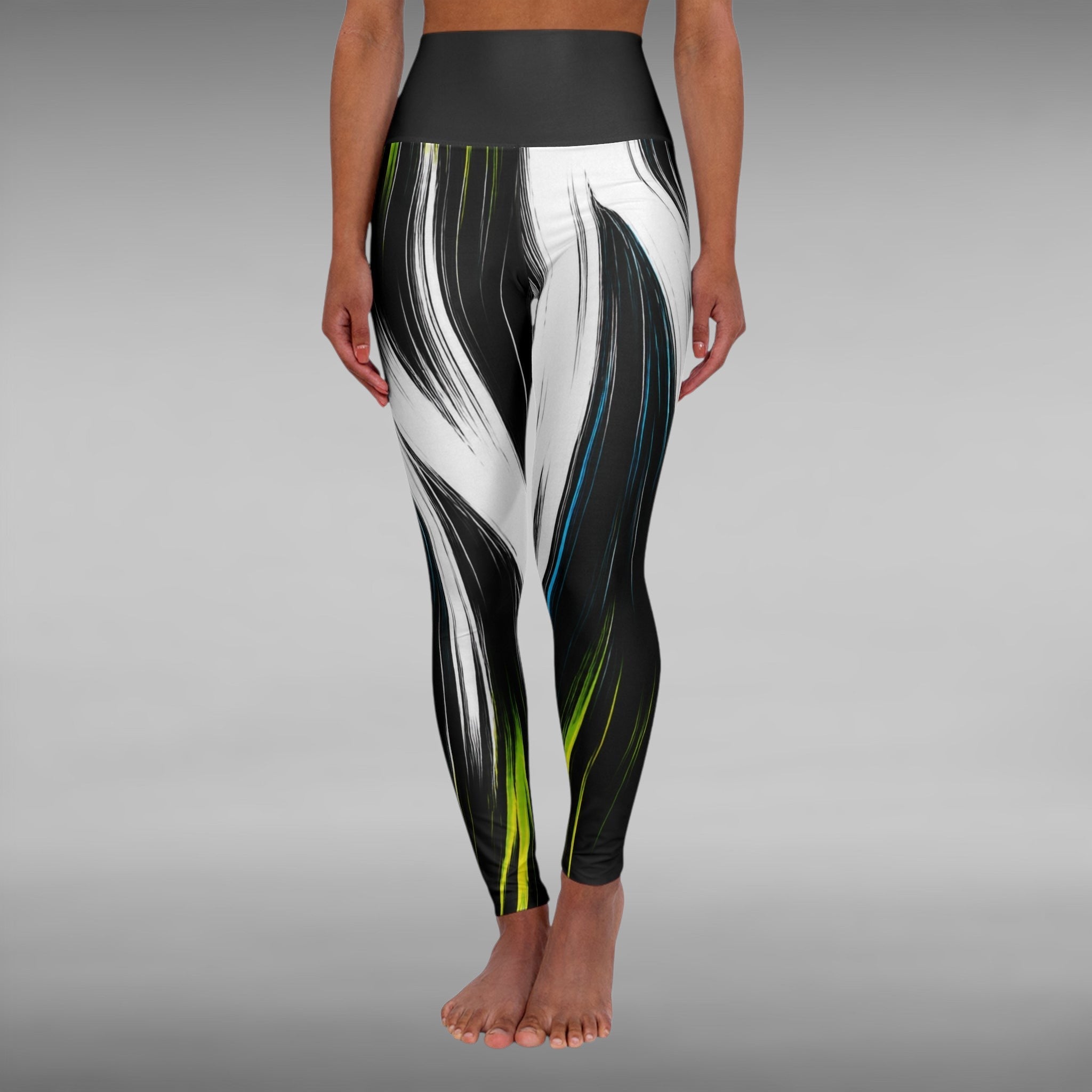 Move Vibe high-waist yoga leggings featuring a black and white brushstroke print with neon green and blue accents.