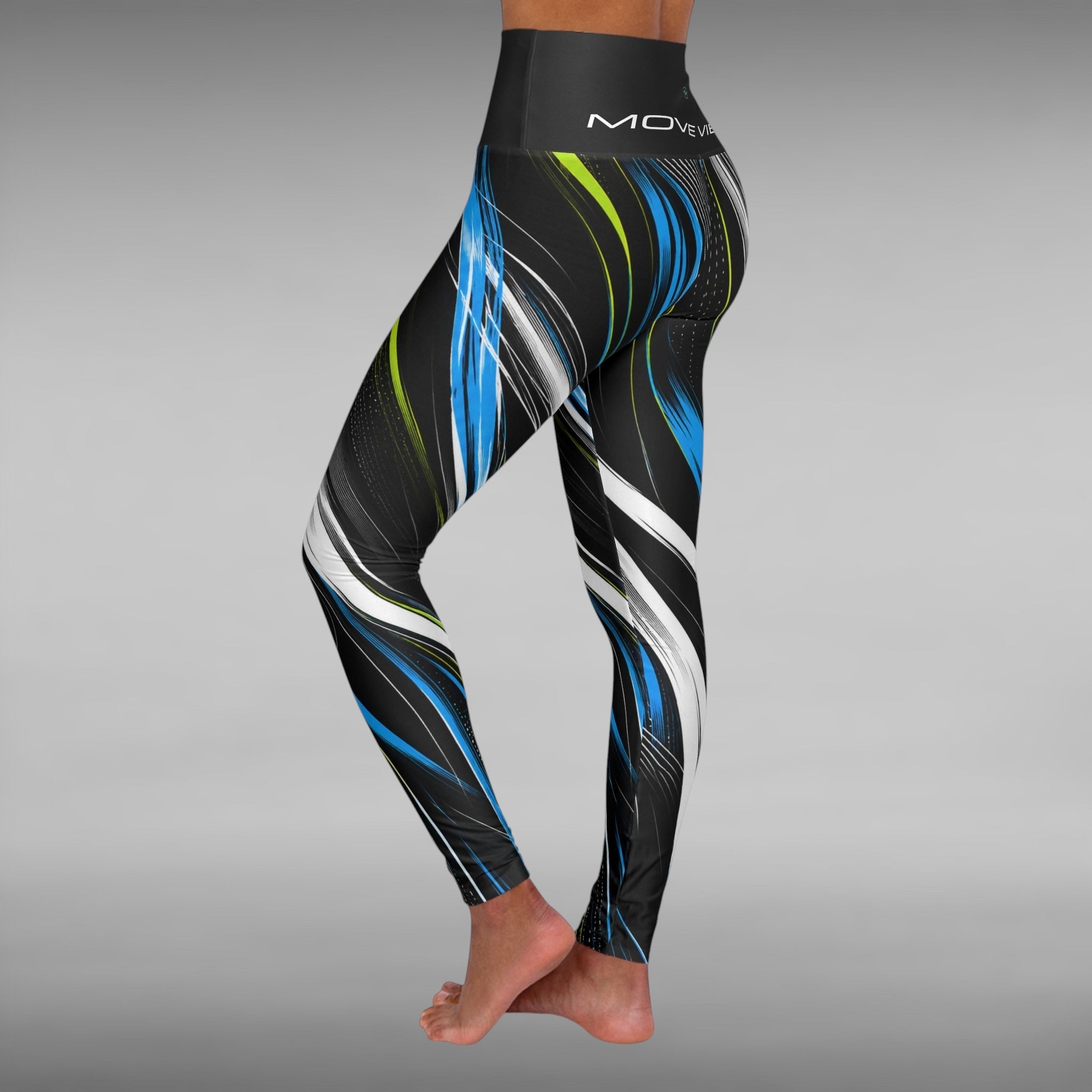 Move Vibe high-waisted yoga leggings featuring a blue, lime, and white swirl print on a black background.
