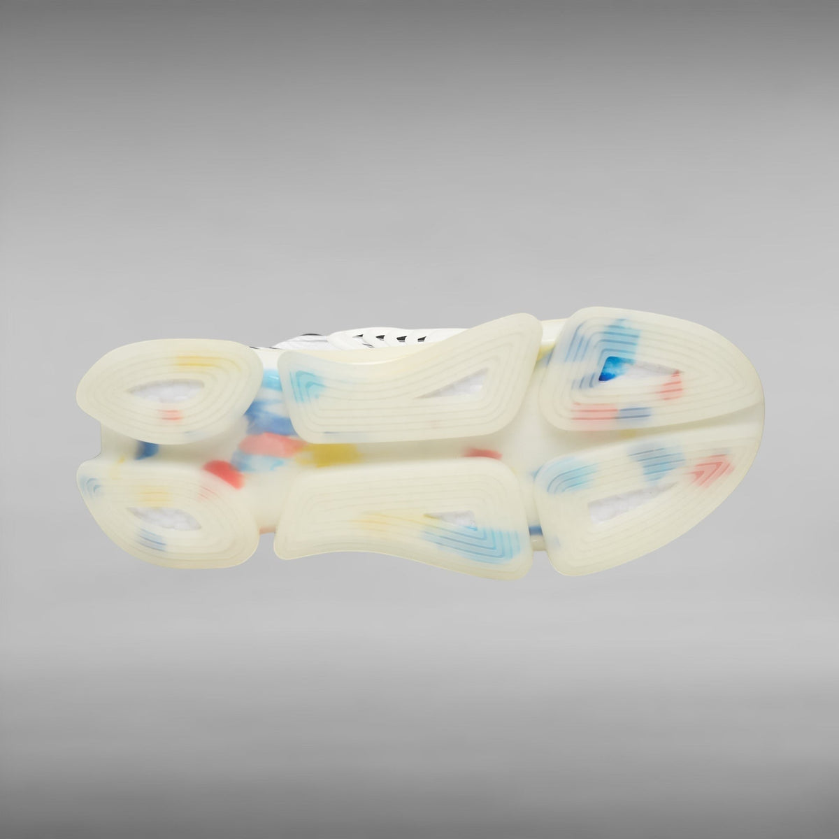 Move Vibe performance running sneaker showing the translucent EVA and TPU sole with colorful speckled detailing.