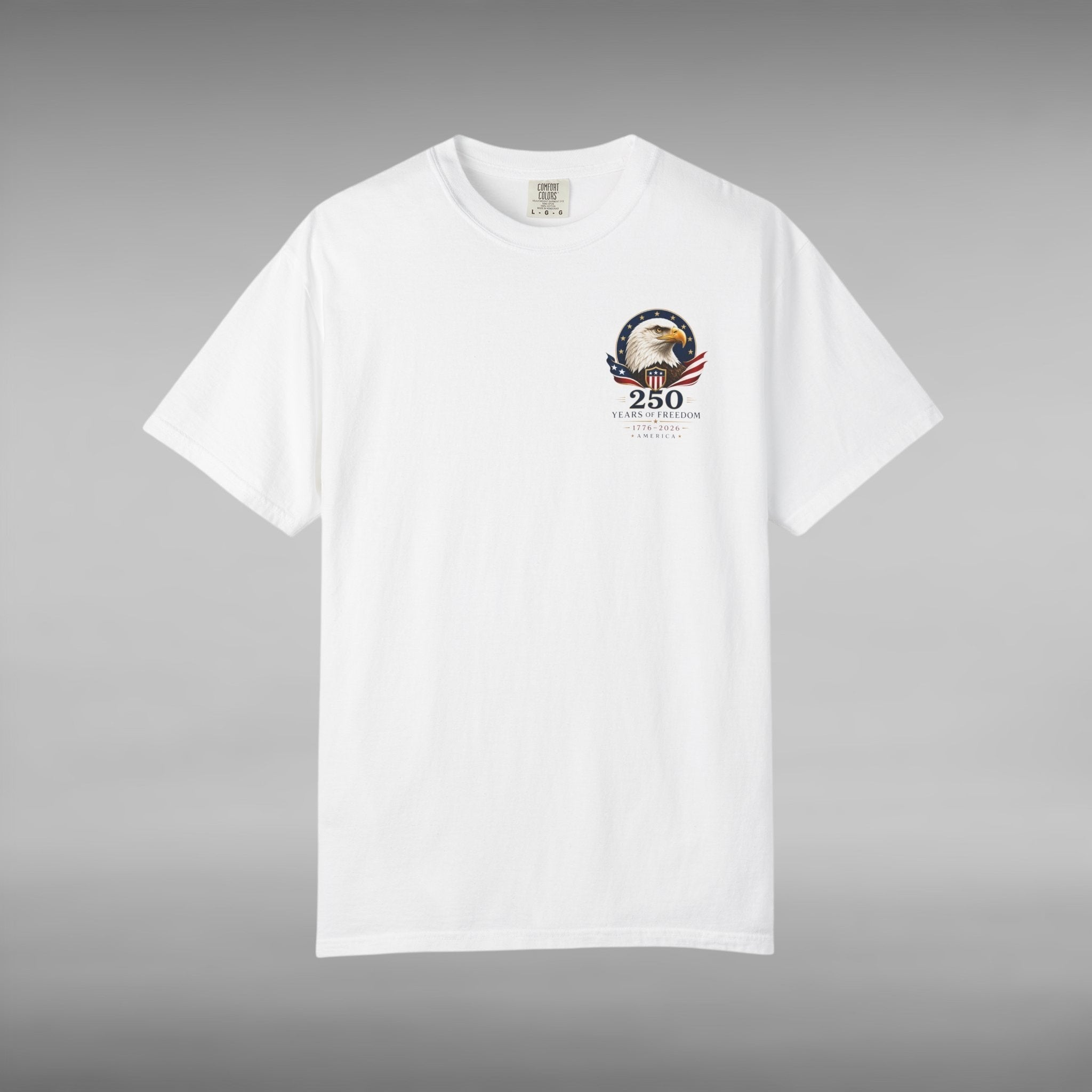 Move Vibe white garment-dyed cotton t-shirt featuring a small America 250 Years of Freedom eagle emblem on the chest.