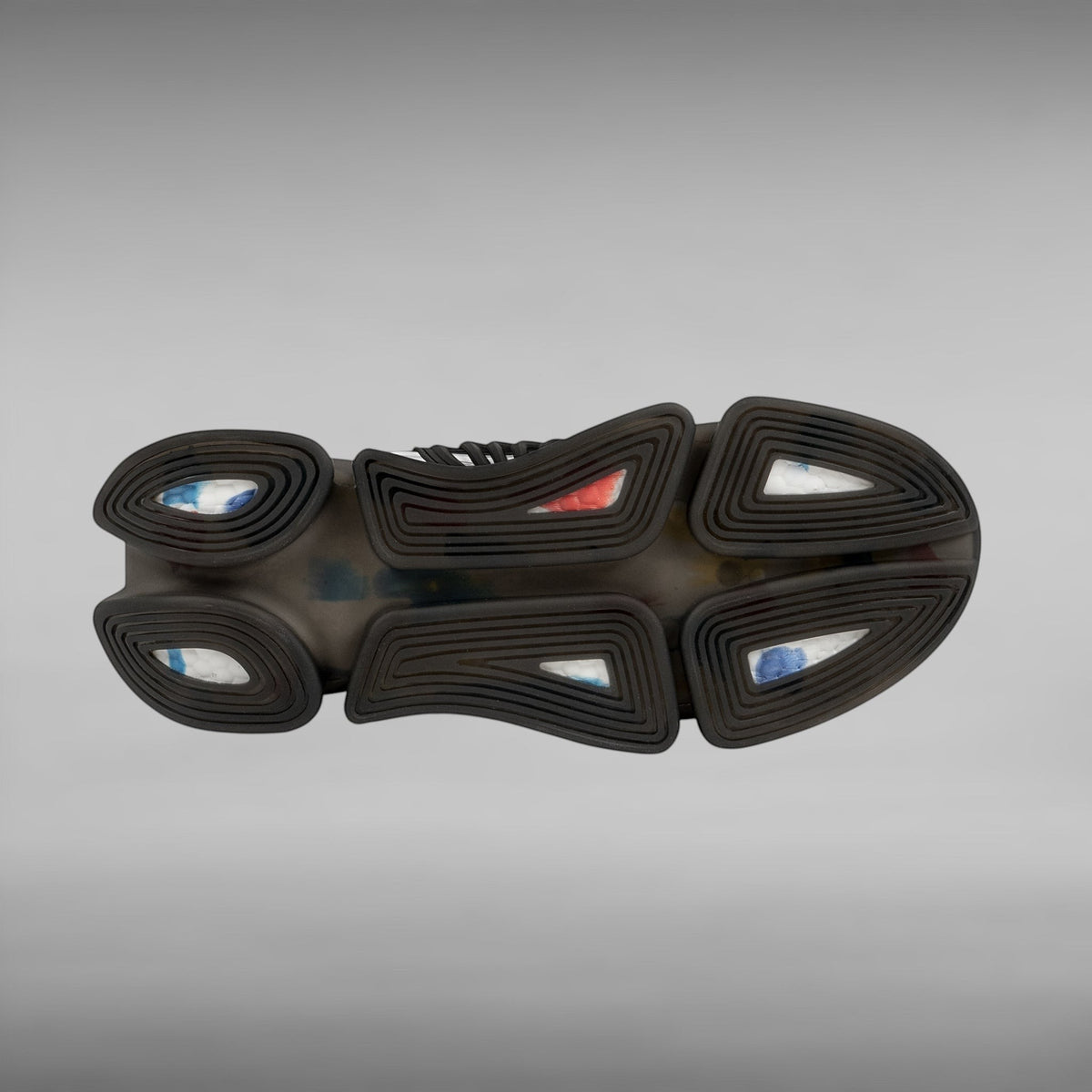Move Vibe performance running sneaker showing the black TPU and EVA shock-absorbing outsole with colorful cushioning