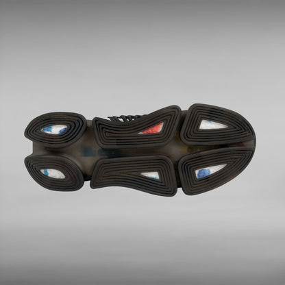 Move Vibe performance running sneaker showing the black TPU and EVA shock-absorbing outsole with colorful cushioning