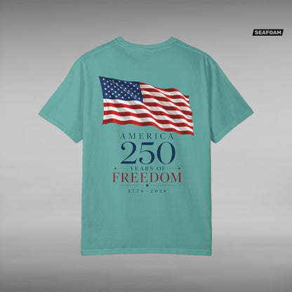 Move Vibe teal garment-dyed cotton t-shirt featuring a back print of a waving American flag and America 250 text.
