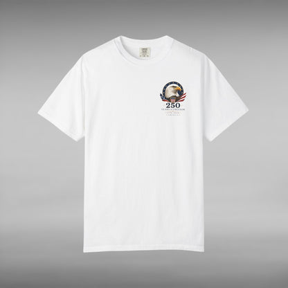 Move Vibe white garment-dyed cotton t-shirt featuring a small America 250 Years of Freedom eagle emblem on the chest.