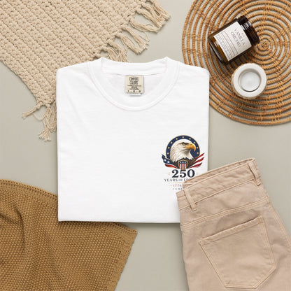 Move Vibe white cotton t-shirt with eagle and 250 years of freedom emblem, flat lay on a neutral background.